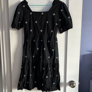 Elegant Black Dress with White Floral Accents